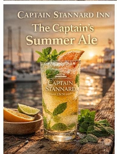 Glass of The Captain's Summer Ale with mint and lime on a wooden dock at sunset; text reads 'Captain Stannard Inn' and 'The Captain's Summer Ale'